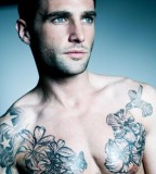 tattoos for men floral chest work