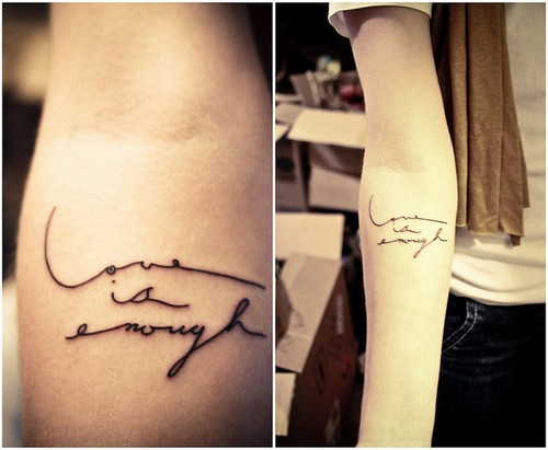 typographic tattoo love is enough