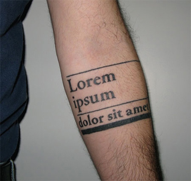 typogrphic arm tattoo lorem ipsum