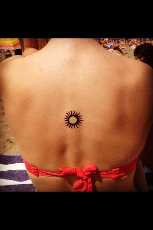 Adorable sun tattoo