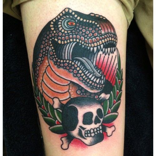 Angry dinosaur tattoo