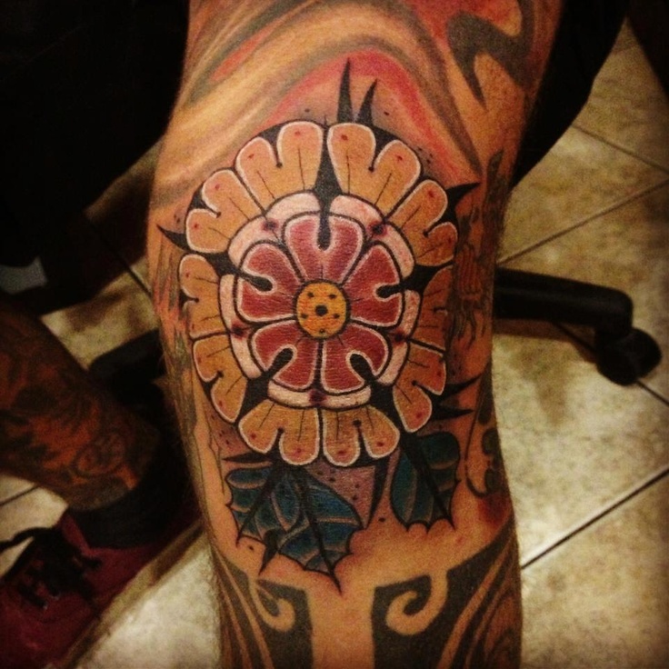 Awesome knee tattoo by Aivaras Lee