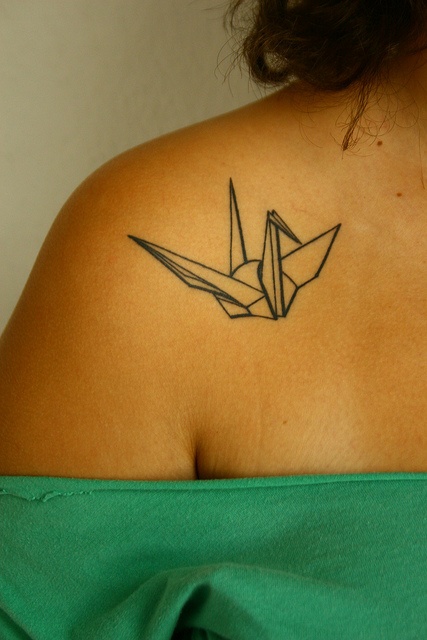 Bird origami tattoo