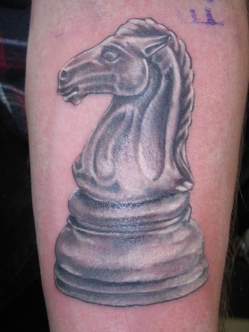 Black and white horse chess tattoo