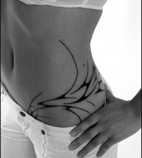 Black hip tattoo