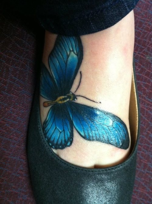 Blue bird tattoo on foot