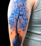 Blue tree tattoo