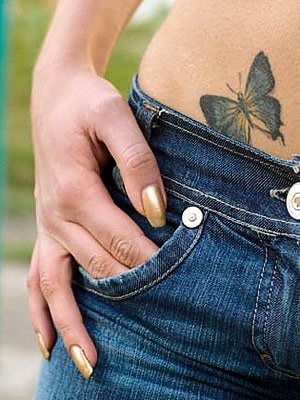 Butterfly hip tattoo