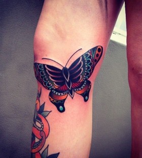 Butterfly tattoo by Kirk Jones