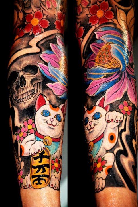 Cat and skull tattoo