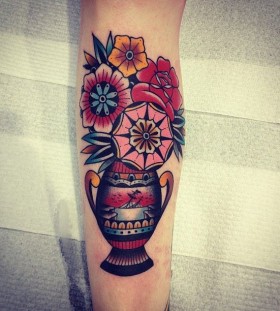 Colorful flowers tattoo by Kirk Jones