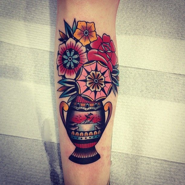 Colorful flowers tattoo by Kirk Jones