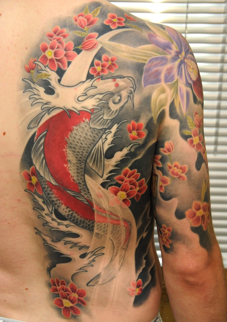 Colorful tattoo by Andy Engel