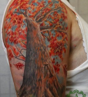 Colorful tree tattoo by Sean Ambrose