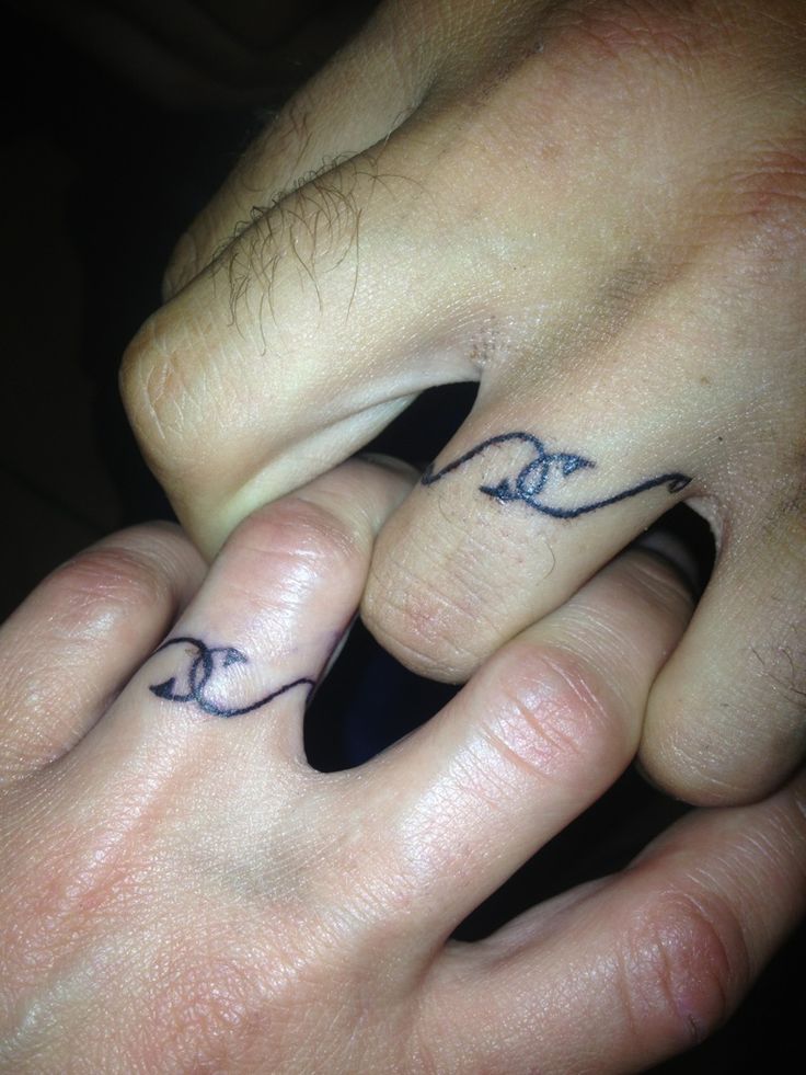 Couple fingers tattoo