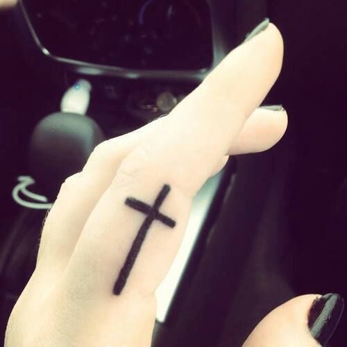 Cross fingers tattoo