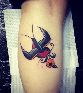 Cute bird tattoo by Kirk Jones