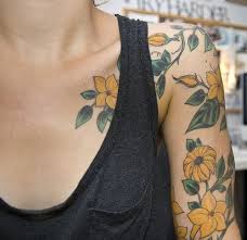 Cute yellow flowers tattoo