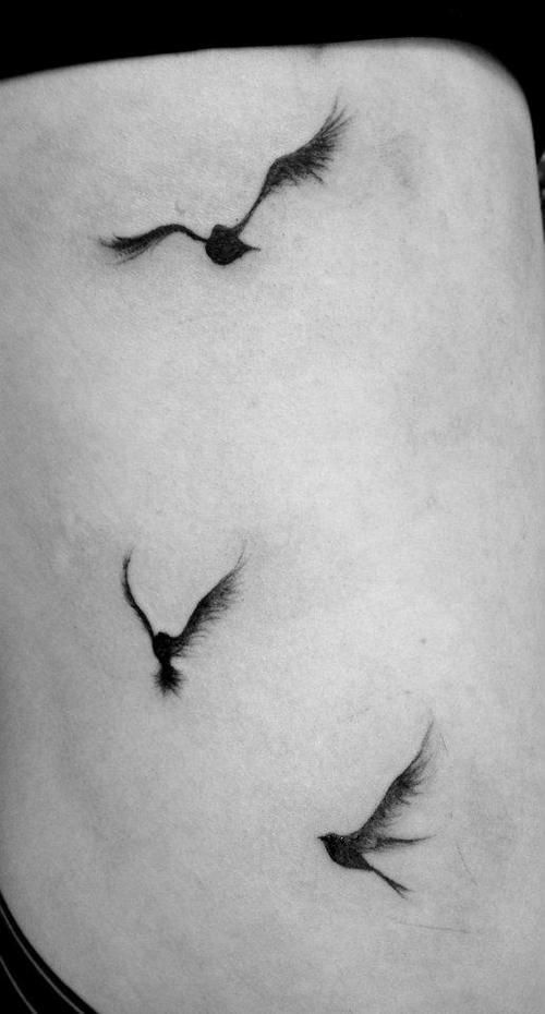 Flying bird tattoo