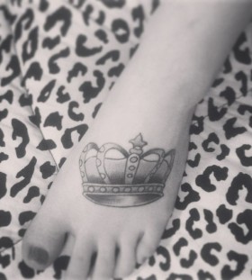 Foot black and white crown tattoo