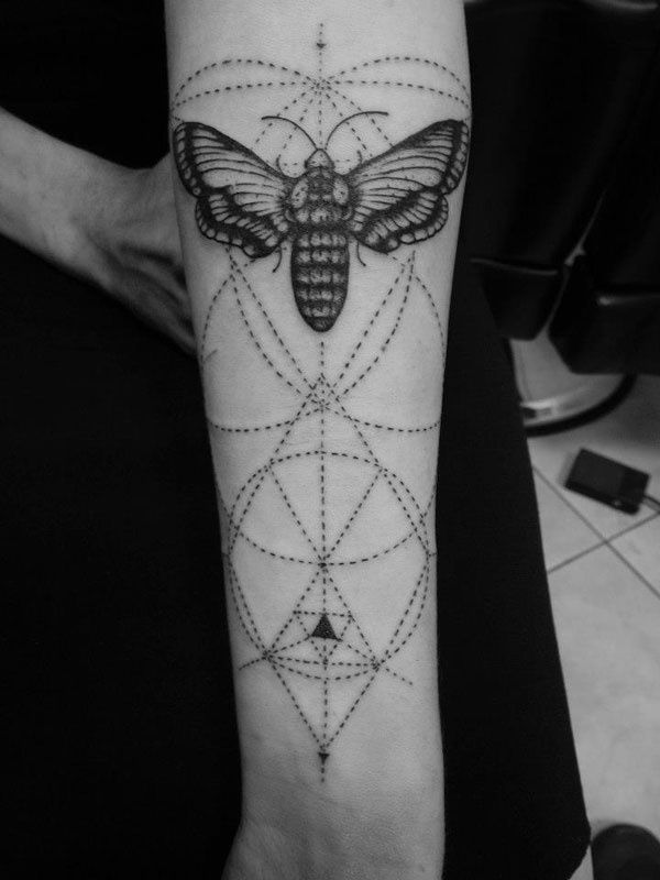 Geomteric butterfly tattoo