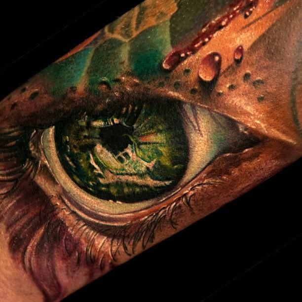 Green eyes tattoo by Andy Engel