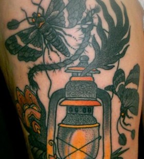 Lamp and bird tattoo