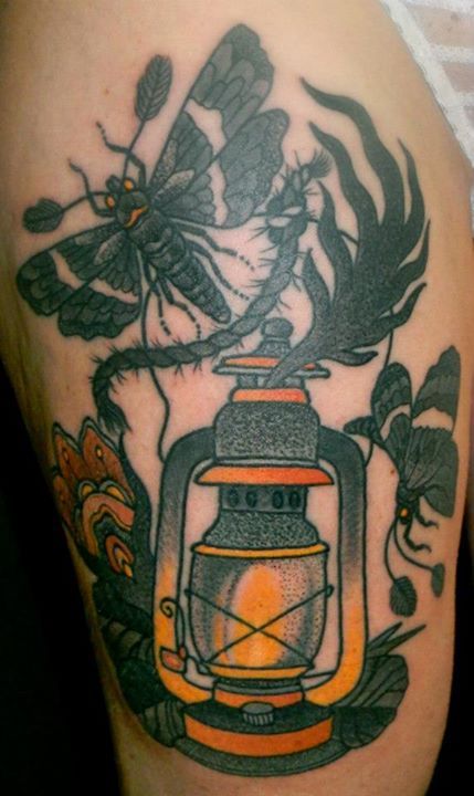 Lamp and bird tattoo