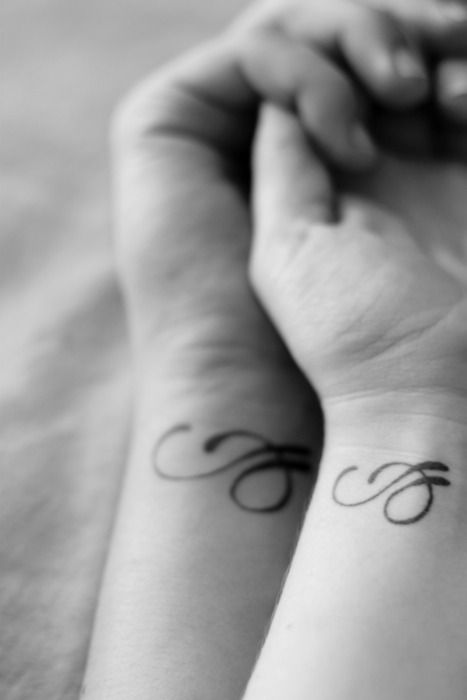 Letter couples tattoo