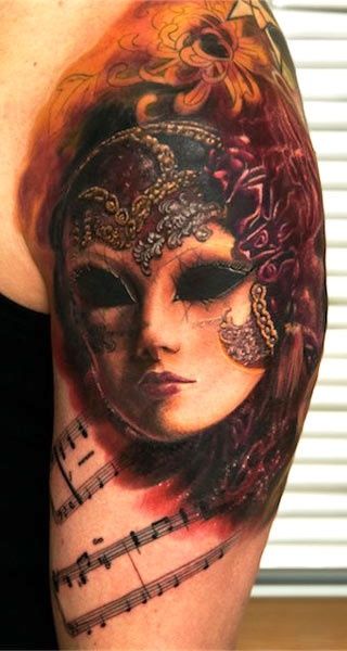 Masks tattoo by Andy Engel