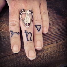Ornaments fingers tattoo