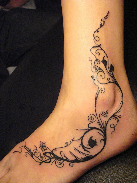 Ornaments tattoo on foot