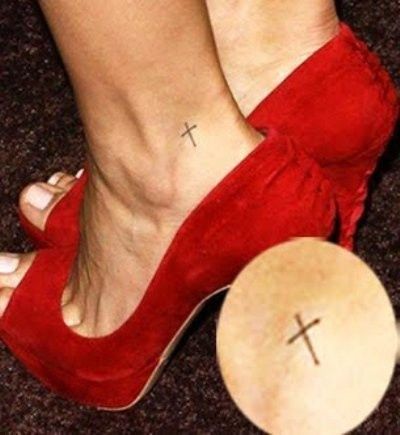 Pretty cross tattoo