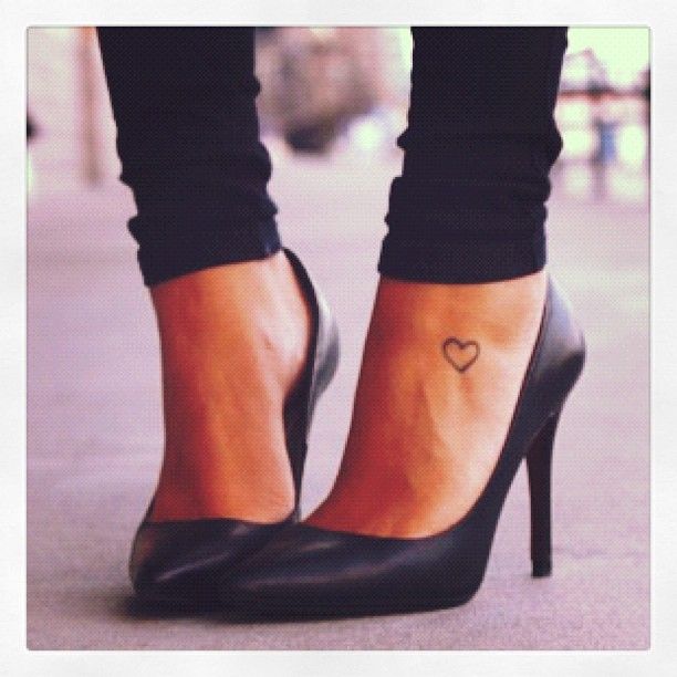 Pretty heart woman tattoo