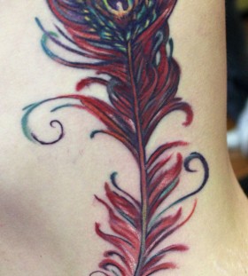 Red feather tattoo by Sean Ambrose