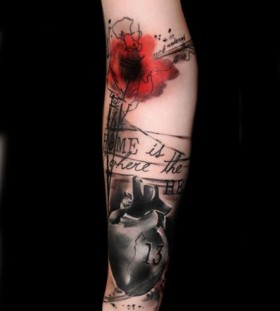 Red flower tattoo by Volko Merschky