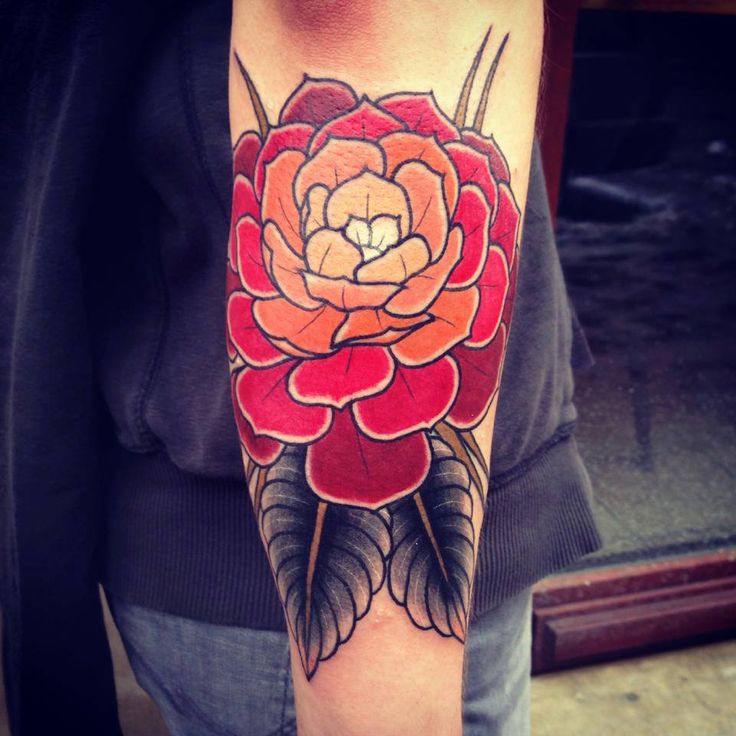 Red flowers tattoo by Aivaras Lee