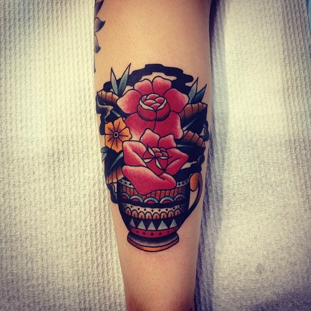 Red tattoo by Kirk Jones