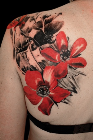 Red tattoo by Volko Merschky
