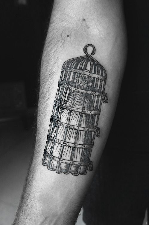 SV.A tattoo caged woman