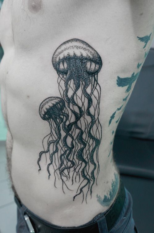 SV.A tattoo jellyfish on ribs