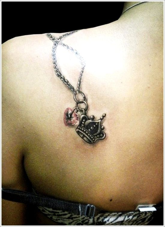 Shoulder crown tattoo