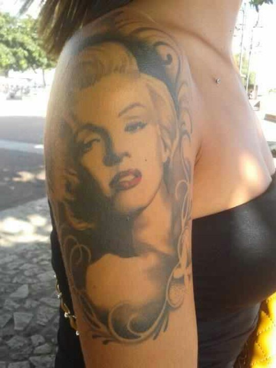 Shoulder tattoo with Marilyn Monroe