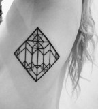 Simple girl geometric tattoo