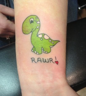 Smiling dinosaur tattoo