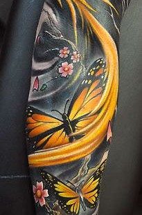 Yellow butterflies tattoo