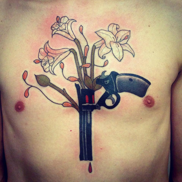 aivaras lee tattoo gun and white flowers