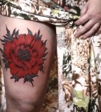 alice carrier big red poppy tattoo