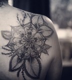 alice carrier tattoo beautiful flower on back shoulder