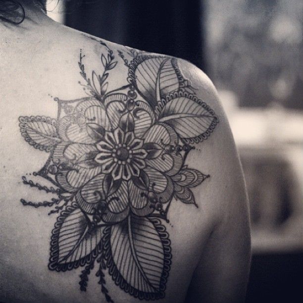 alice carrier tattoo beautiful flower on back shoulder